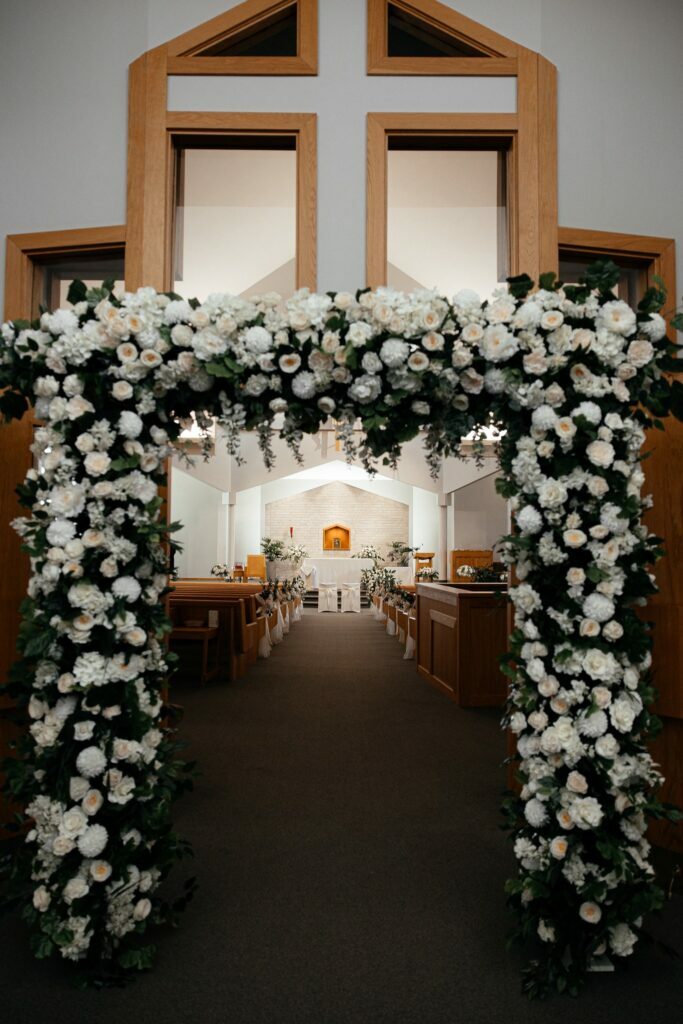 , Beautiful Catholic Wedding Decorations in Canada: Ideas for Altar Flowers, Pew Bows, Unity Candles, Crosses, and Plaques, Blooms Collection Inc.
